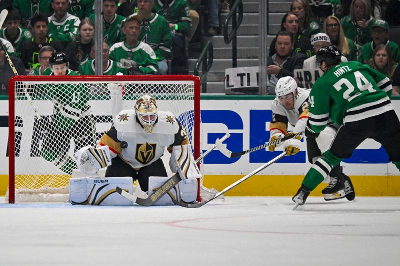 Apr 24, 2024; Dallas, Texas, USA; Vegas Golden Knights goaltender Logan Thompson (36) stops a shot by Dallas Stars center Roope Hintz (24) during the third period in game two of the first round of the 2024 Stanley Cup Playoffs at American Airlines Center. Mandatory Credit: Jerome Miron-USA TODAY Sports