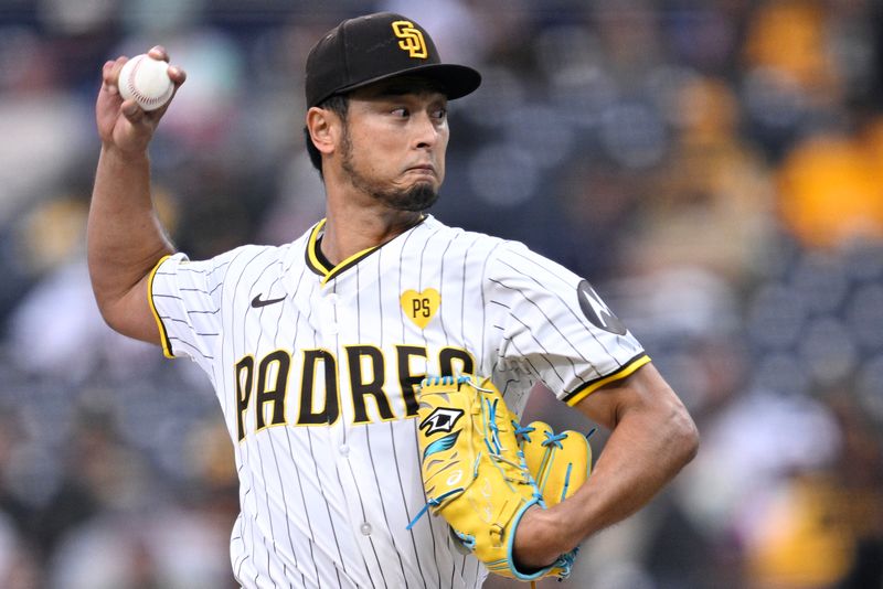 Apr 30, 2024; San Diego, California, USA; San Diego Padres starting pitcher Yu Darvish (11) throws a pitch against the Cincinnati Reds during the first inning at Petco Park. Mandatory Credit: Orlando Ramirez-USA TODAY Sports