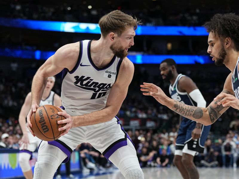 DALLAS, TX - JANUARY 27: Domantas Sabonis #10 of the Sacramento Kings handles the ball during the game  on January 27, 2024 at the American Airlines Center in Dallas, Texas. NOTE TO USER: User expressly acknowledges and agrees that, by downloading and or using this photograph, User is consenting to the terms and conditions of the Getty Images License Agreement. Mandatory Copyright Notice: Copyright 2024 NBAE (Photo by Glenn James/NBAE via Getty Images)