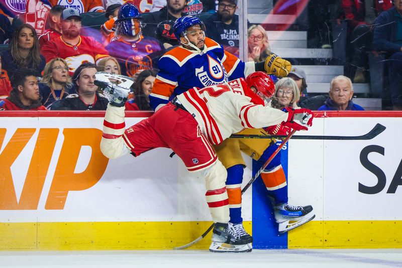 Jan 20, 2024; Calgary, Alberta, CAN; Calgary Flames defenseman Jordan Oesterle (82) checks into the boards Edmonton Oilers left wing Evander Kane (91) during the second period at Scotiabank Saddledome. Mandatory Credit: Sergei Belski-USA TODAY Sports