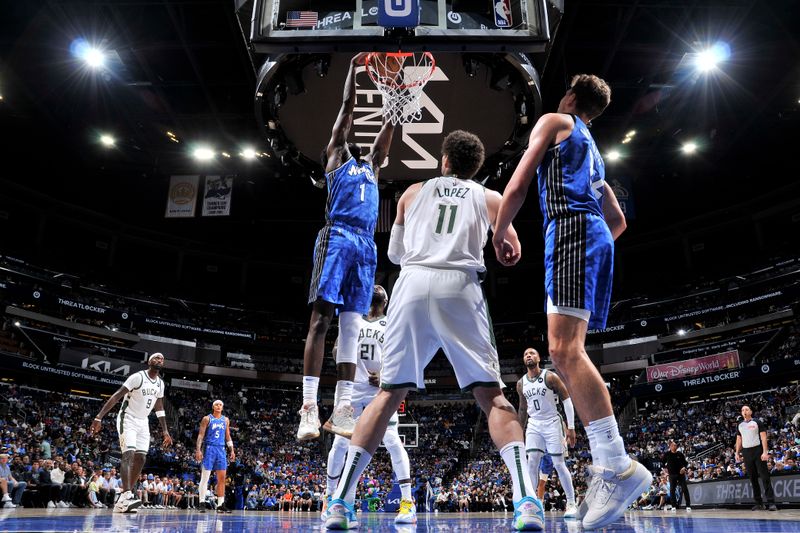 ORLANDO, FL - APRIL 14: Jonathan Isaac #1 of the Orlando Magic dunks the ball during the game against the Milwaukee Bucks on April 14, 2024 at Kia Center in Orlando, Florida. NOTE TO USER: User expressly acknowledges and agrees that, by downloading and or using this photograph, User is consenting to the terms and conditions of the Getty Images License Agreement. Mandatory Copyright Notice: Copyright 2024 NBAE (Photo by Fernando Medina/NBAE via Getty Images)