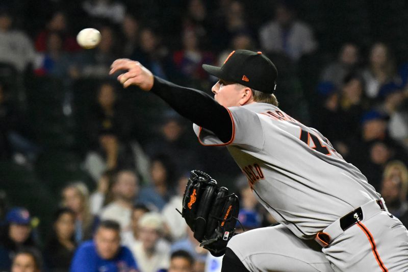 May 6, 2025; Chicago, Illinois, USA;  San Francisco Giants pitcher Kyle Harrison (45) delivers during the eleventh inning against the Chicago Cubs at Wrigley Field. Mandatory Credit: Matt Marton-Imagn Images