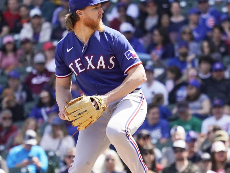 Apr 9, 2023; Chicago, Illinois, USA; Texas Rangers starting pitcher Jon Gray (22) throws the ball against the Chicago Cubs during the first inning at Wrigley Field. Mandatory Credit: David Banks-USA TODAY Sports