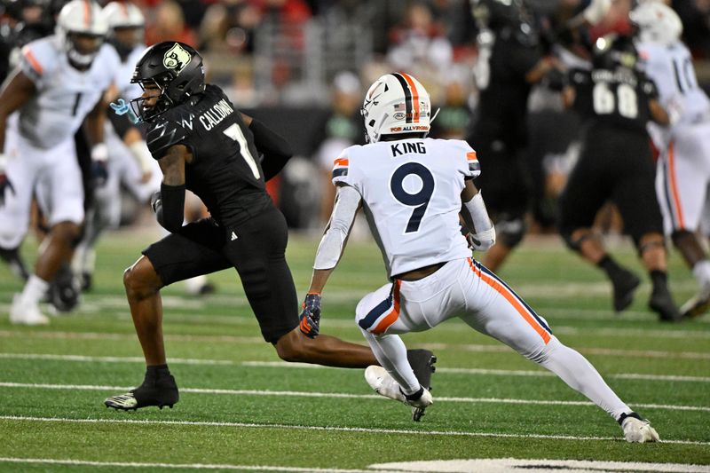 Nov 9, 2023; Louisville, Kentucky, USA; Louisville Cardinals wide receiver Jimmy Calloway (7) runs the ball against Virginia Cavaliers safety Coen King (9) during the first half at L&N Federal Credit Union Stadium. Mandatory Credit: Jamie Rhodes-USA TODAY Sports