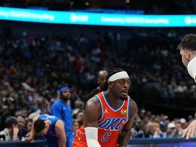 DALLAS, TX - DECEMBER 2: Luguentz Dort #5 of the Oklahoma City Thunder goes to the basket during the game on December 2, 2023 at the American Airlines Center in Dallas, Texas. NOTE TO USER: User expressly acknowledges and agrees that, by downloading and or using this photograph, User is consenting to the terms and conditions of the Getty Images License Agreement. Mandatory Copyright Notice: Copyright 2023 NBAE (Photo by Glenn James/NBAE via Getty Images)