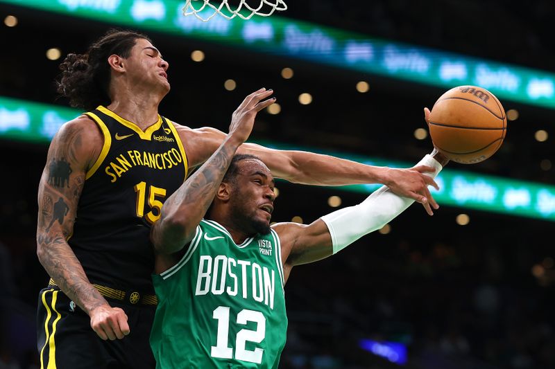 BOSTON, MASSACHUSETTS - MARCH 03: Gui Santos #15 of the Golden State Warriors and Oshae Brissett #12 of the Boston Celtics battle for a rebound during the second half at TD Garden on March 03, 2024 in Boston, Massachusetts. The Celtics defeat the Warriors 140-88. NOTE TO USER: User expressly acknowledges and agrees that, by downloading and or using this photograph, user is consenting to the terms and conditions of the Getty Images License Agreement.  (Photo by Maddie Meyer/Getty Images)