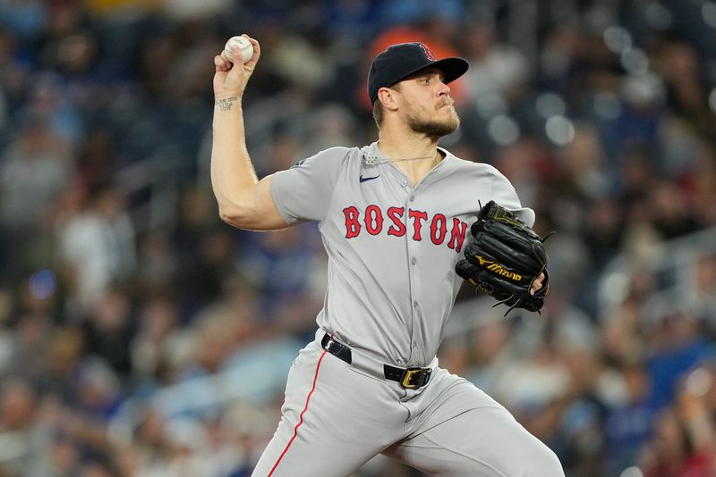 Sep 23, 2024; Toronto, Ontario, CAN; Boston Red Sox starting pitcher Tanner Houck (89) pitches to the Toronto Blue Jays during the first inning at Rogers Centre. Mandatory Credit: John E. Sokolowski-Imagn Images