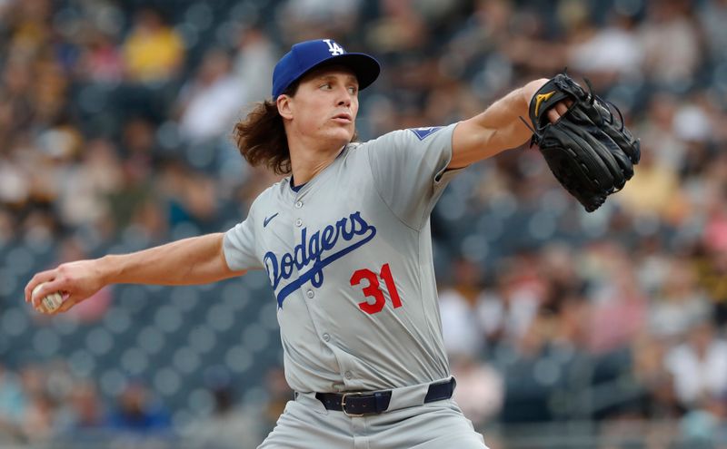 Jun 4, 2024; Pittsburgh, Pennsylvania, USA;  Los Angeles Dodgers starting pitcher Tyler Glasnow (31) delivers a pitch against the Pittsburgh Pirates during the first inning at PNC Park. Mandatory Credit: Charles LeClaire-USA TODAY Sports