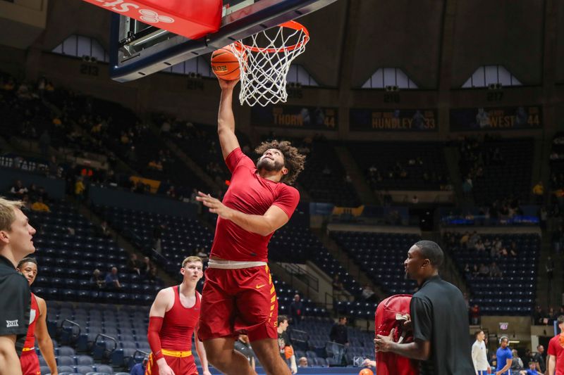 Jan 18, 2025; Morgantown, West Virginia, USA; Iowa State Cyclones forward Kayden Fish (11) warms up prior to the game against the West Virginia Mountaineers at WVU Coliseum. Mandatory Credit: Ben Queen-Imagn Images