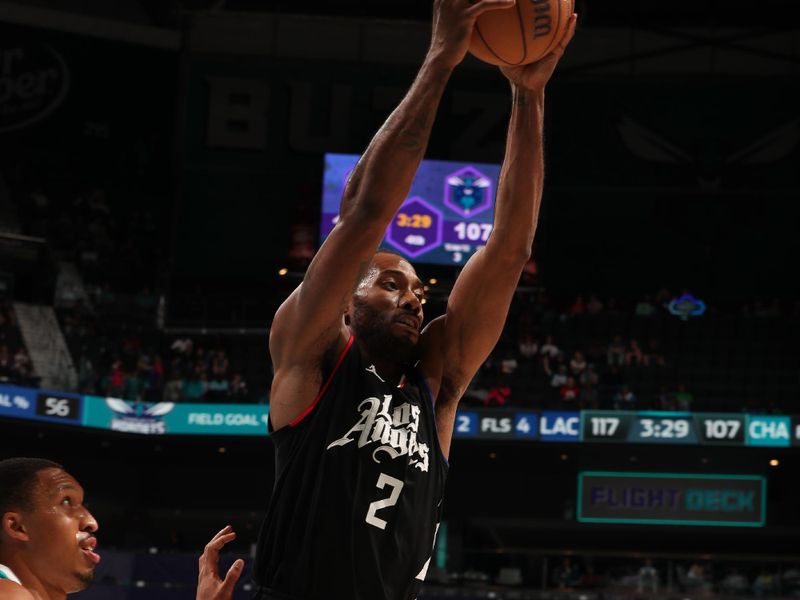 CHARLOTTE, NC - MARCH 31: Kawhi Leonard #2 of the LA Clippers grabs the rebound during the game against the Charlotte Hornets on March 31, 2024 at Spectrum Center in Charlotte, North Carolina. NOTE TO USER: User expressly acknowledges and agrees that, by downloading and or using this photograph, User is consenting to the terms and conditions of the Getty Images License Agreement. Mandatory Copyright Notice: Copyright 2024 NBAE (Photo by Kent Smith/NBAE via Getty Images)