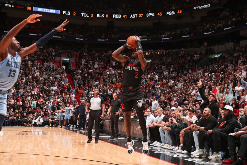 MIAMI, FL - JANUARY 24:  Terry Rozier #2 of the Miami Heat shoots a three point basket during the game against the Memphis Grizzlies on January 24, 2024 at Kaseya Center in Miami, Florida. NOTE TO USER: User expressly acknowledges and agrees that, by downloading and or using this Photograph, user is consenting to the terms and conditions of the Getty Images License Agreement. Mandatory Copyright Notice: Copyright 2024 NBAE (Photo by Issac Baldizon/NBAE via Getty Images)