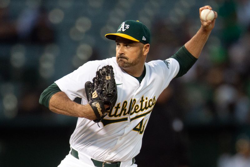 Jun 5, 2024; Oakland, California, USA; Oakland Athletics pitcher T.J. McFarland (48) delivers a pitch against the Seattle Mariners during the seventh inning at Oakland-Alameda County Coliseum. Mandatory Credit: D. Ross Cameron-USA TODAY Sports