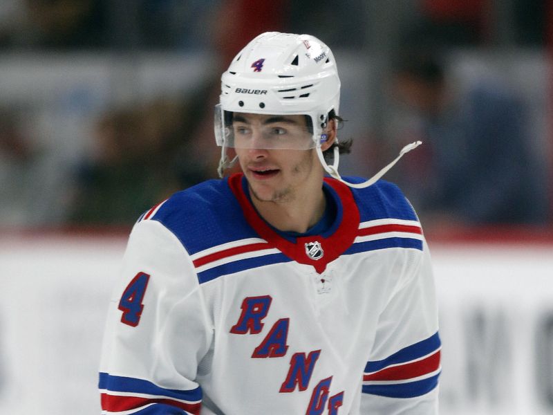 Mar 16, 2024; Pittsburgh, Pennsylvania, USA; New York Rangers defenseman Braden Schneider (4) warms up before the game against the Pittsburgh Penguins at PPG Paints Arena. Mandatory Credit: Charles LeClaire-USA TODAY Sports