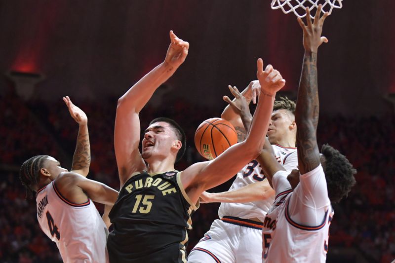 Mar 5, 2024; Champaign, Illinois, USA; Purdue Boilermakers center Zach Edey (15) loses the ball after Illinois Fighting Illini forward Coleman Hawkins (33) slaps it away during the second half at State Farm Center. Mandatory Credit: Ron Johnson-USA TODAY Sports