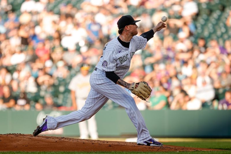 Jul 28, 2023; Denver, Colorado, USA; Colorado Rockies starting pitcher Kyle Freeland (21) pitches in the first inning against the Oakland Athletics at Coors Field. Mandatory Credit: Isaiah J. Downing-USA TODAY Sports