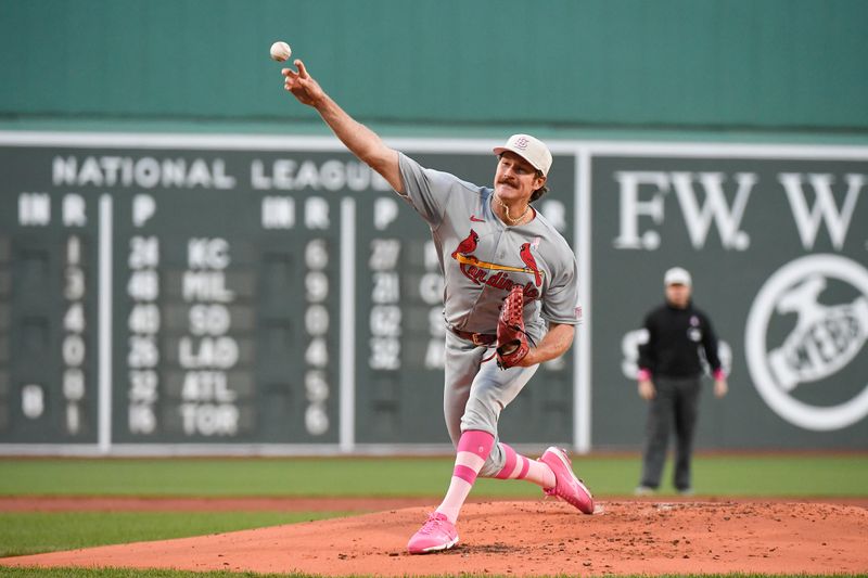 May 14, 2023; Boston, Massachusetts, USA; St. Louis Cardinals starting pitcher Miles Mikolas (39) pitches against the Boston Red Sox during the first inning at Fenway Park. Mandatory Credit: Eric Canha-USA TODAY Sports