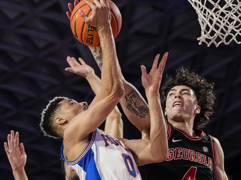 Feb 28, 2023; Athens, Georgia, USA; Florida Gators guard Trey Bonham (2) is defended under the basket by Georgia Bulldogs guard Jusaun Holt (4) and guard Jabri Abdur-Rahim (1) during the first half at Stegeman Coliseum. Mandatory Credit: Dale Zanine-USA TODAY Sports