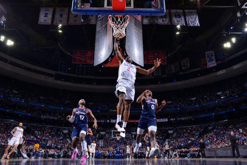 PHILADELPHIA, PA - MARCH 27: Kawhi Leonard #2 of the LA Clippers dunks the ball during the game against the Philadelphia 76ers on March 27, 2024 at the Wells Fargo Center in Philadelphia, Pennsylvania NOTE TO USER: User expressly acknowledges and agrees that, by downloading and/or using this Photograph, user is consenting to the terms and conditions of the Getty Images License Agreement. Mandatory Copyright Notice: Copyright 2024 NBAE (Photo by Jesse D. Garrabrant/NBAE via Getty Images)