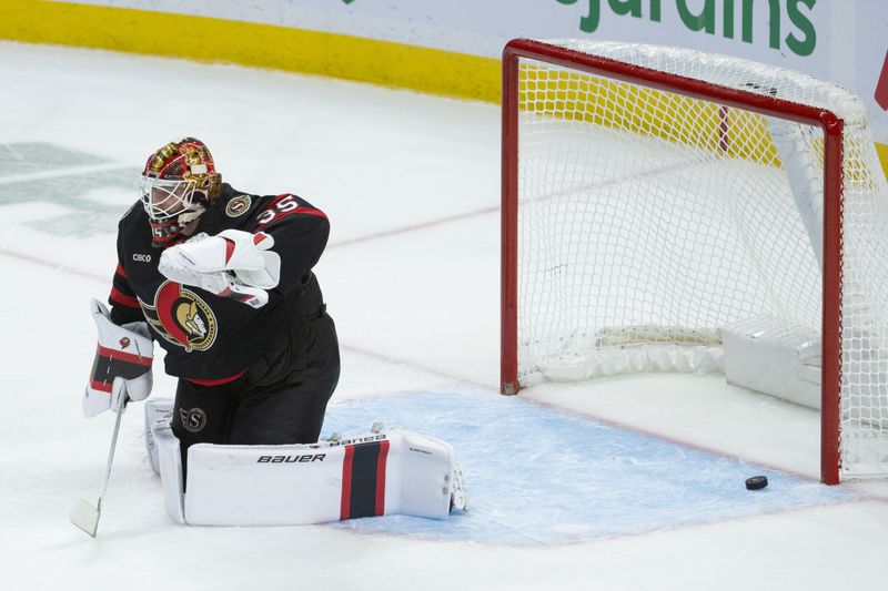 Oct 21, 2025; Ottawa, Ontario, CAN; Ottawa Senators goalie Linus Ullmark (35) is unable to stop a shot from Edmonton Oilers defenseman Jake Walman (not pictured) in overtime at the Canadian Tire Centre. Mandatory Credit: Marc DesRosiers-IMAGN Images