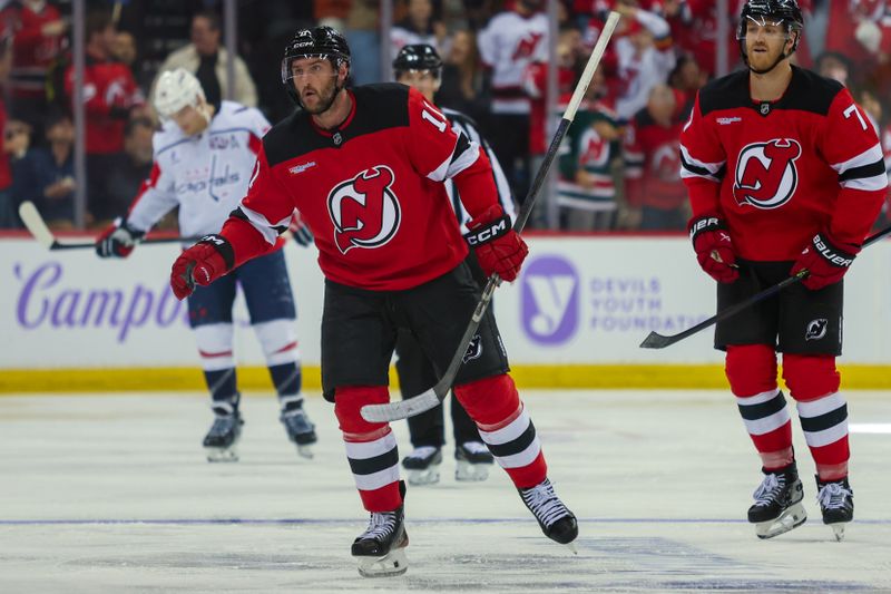 Nov 30, 2024; Newark, New Jersey, USA; New Jersey Devils right wing Stefan Noesen (11) after scoring his goal warms up prior to a game against during the third period at Prudential Center. Mandatory Credit: Thomas Salus-Imagn Images