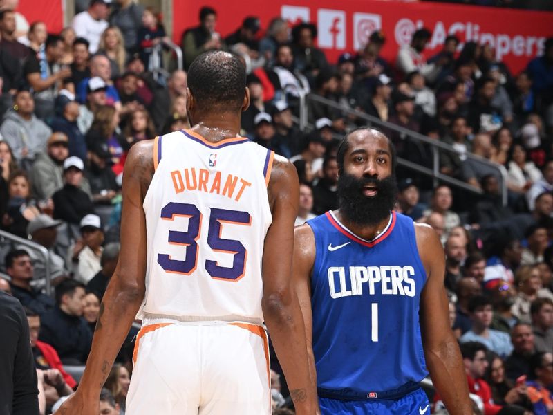 LOS ANGELES, CA - JANUARY 8: Kevin Durant #35 of the Phoenix Suns talks to James Harden #1 of the LA Clippers during the game on January 8, 2024 at Crypto.Com Arena in Los Angeles, California. NOTE TO USER: User expressly acknowledges and agrees that, by downloading and/or using this Photograph, user is consenting to the terms and conditions of the Getty Images License Agreement. Mandatory Copyright Notice: Copyright 2024 NBAE (Photo by Andrew D. Bernstein/NBAE via Getty Images)