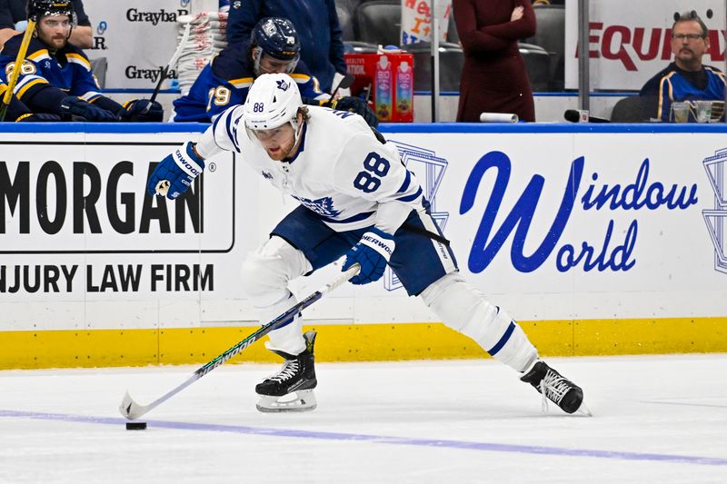 Feb 19, 2024; St. Louis, Missouri, USA;  Toronto Maple Leafs right wing William Nylander (88) controls the puck against the St. Louis Blues during the third period at Enterprise Center. Mandatory Credit: Jeff Curry-USA TODAY Sports