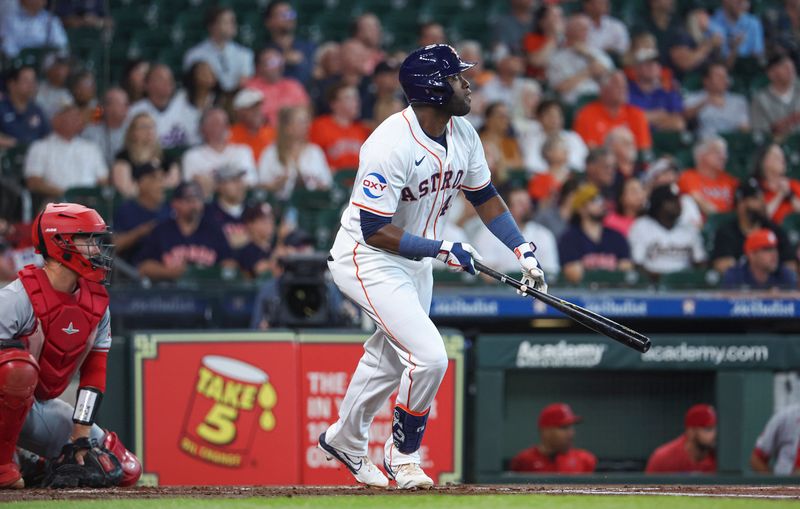 May 22, 2024; Houston, Texas, USA; Houston Astros designated hitter Yordan Alvarez (44) hits a double during the first inning against the Los Angeles Angels at Minute Maid Park. Mandatory Credit: Troy Taormina-USA TODAY Sports