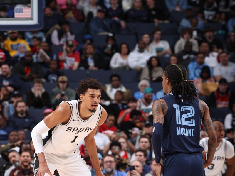 MEMPHIS, TN - FEBRUARY 3:  Victor Wembanyama #1 of the San Antonio Spurs plays defense during the game against Ja Morant #12 of the Memphis Grizzlies on February 3, 2025 at FedExForum in Memphis, Tennessee. NOTE TO USER: User expressly acknowledges and agrees that, by downloading and or using this photograph, User is consenting to the terms and conditions of the Getty Images License Agreement. Mandatory Copyright Notice: Copyright 2025 NBAE (Photo by Joe Murphy/NBAE via Getty Images)