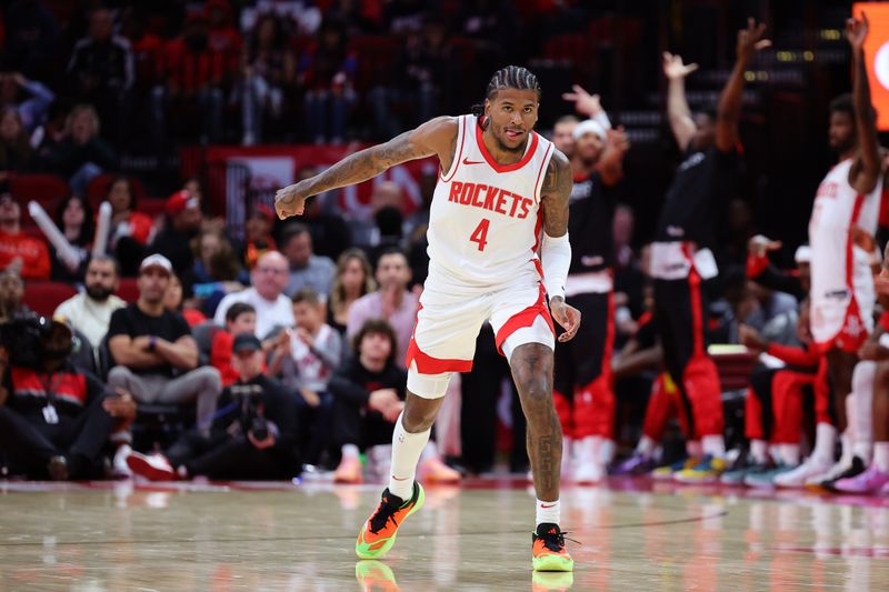 HOUSTON, TEXAS - OCTOBER 17: Jalen Green #4 of the Houston Rockets celebrates a three-point basket against the San Antonio Spurs during the second half of a preseason game at Toyota Center on October 17, 2024 in Houston, Texas. NOTE TO USER: User expressly acknowledges and agrees that, by downloading and or using this photograph, User is consenting to the terms and conditions of the Getty Images License Agreement. (Photo by Alex Slitz/Getty Images)