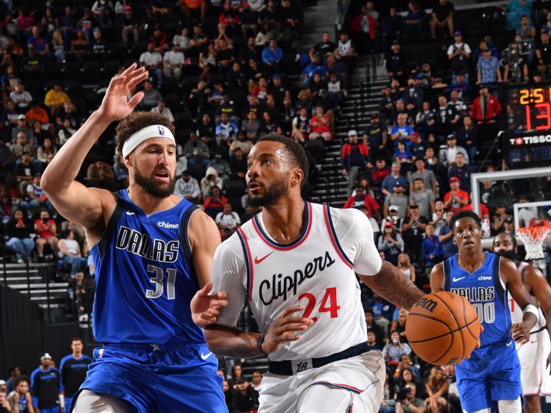 INGLEWOOD, CA - OCTOBER 14: Norman Powell #24 of the LA Clippers drives to the basket during the game against the Dallas Mavericks on October 14, 2024 at Intuit Dome in Los Angeles, California. NOTE TO USER: User expressly acknowledges and agrees that, by downloading and/or using this Photograph, user is consenting to the terms and conditions of the Getty Images License Agreement. Mandatory Copyright Notice: Copyright 2024 NBAE (Photo by Juan Ocampo/NBAE via Getty Images)