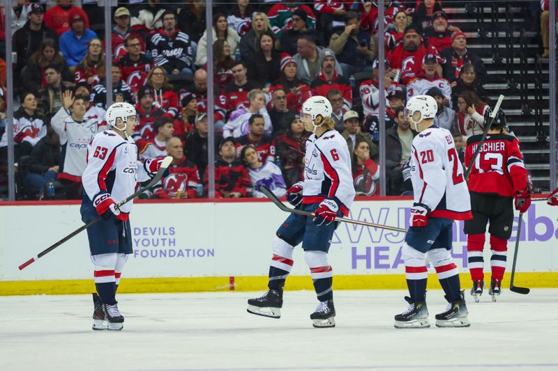 Nov 30, 2024; Newark, New Jersey, USA; Washington Capitals defenseman Jakob Chychrun (6) celebrates his goal against the New Jersey Devils during the second period at Prudential Center. Mandatory Credit: Thomas Salus-Imagn Images