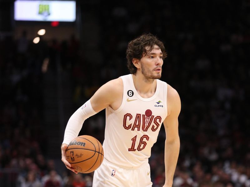 CLEVELAND, OH - NOVEMBER 23: Cedi Osman #16 of the Cleveland Cavaliers dribbles the ball during the game against the Portland Trail Blazers on November 23, 2022 at Rocket Mortgage FieldHouse in Cleveland, Ohio. NOTE TO USER: User expressly acknowledges and agrees that, by downloading and/or using this Photograph, user is consenting to the terms and conditions of the Getty Images License Agreement. Mandatory Copyright Notice: Copyright 2022 NBAE (Photo by  Lauren Leigh Bacho/NBAE via Getty Images)