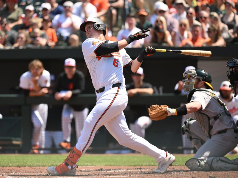 Apr 28, 2024; Baltimore, Maryland, USA;  Baltimore Orioles first baseman Ryan Mountcastle (6) singles during the second inning against the Oakland Athletics at Oriole Park at Camden Yards. Mandatory Credit: James A. Pittman-USA TODAY Sports