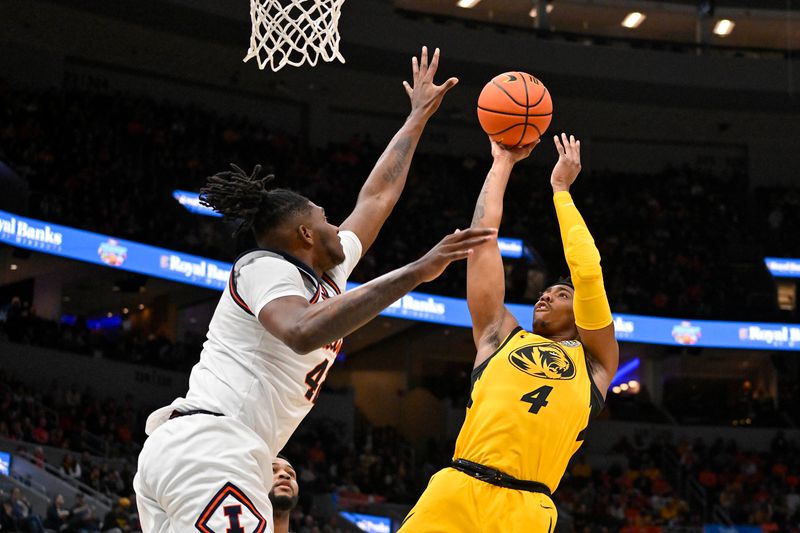 Dec 22, 2022; St. Louis, Missouri, USA;  Missouri Tigers guard DeAndre Gholston (4) shoots against Illinois Fighting Illini forward Dain Dainja (42) during the first half at Enterprise Center. Mandatory Credit: Jeff Curry-USA TODAY Sports