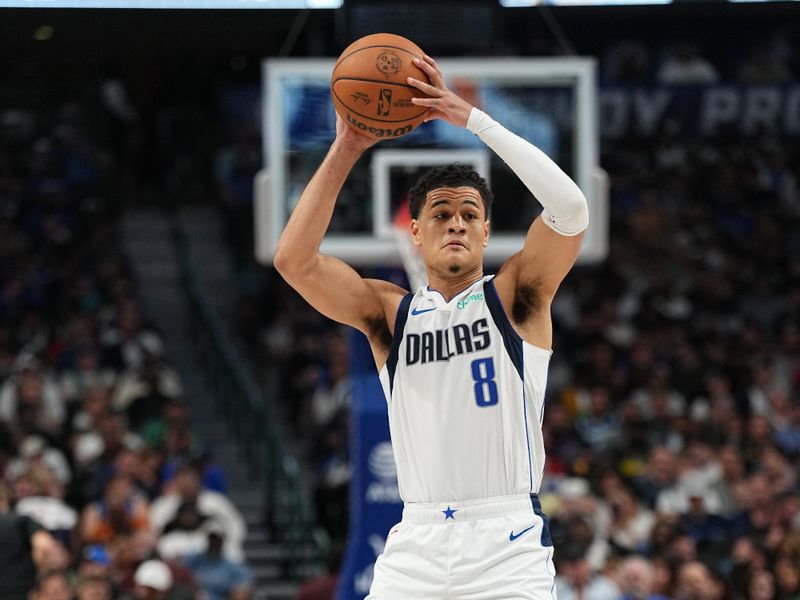 DALLAS, TX - MARCH 13: Josh Green #8 of the Dallas Mavericks looks to pass the ball during the game against the Golden State Warriors on March 13, 2024 at the American Airlines Center in Dallas, Texas. NOTE TO USER: User expressly acknowledges and agrees that, by downloading and or using this photograph, User is consenting to the terms and conditions of the Getty Images License Agreement. Mandatory Copyright Notice: Copyright 2024 NBAE (Photo by Glenn James/NBAE via Getty Images)