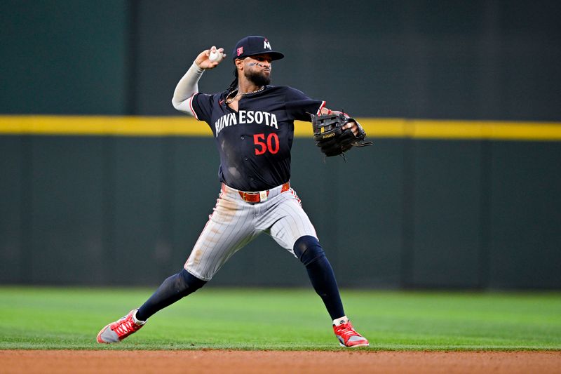 Aug 18, 2024; Arlington, Texas, USA; Minnesota Twins shortstop Willi Castro (50) throws to first base during the fifth inning against the Texas Rangers at Globe Life Field. Mandatory Credit: Jerome Miron-USA TODAY Sports