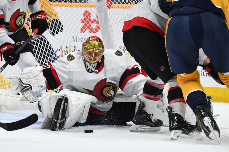 Feb 27, 2024; Nashville, Tennessee, USA; Ottawa Senators goaltender Joonas Korpisalo (70) makes a save during the third period against the Nashville Predators at Bridgestone Arena. Mandatory Credit: Christopher Hanewinckel-USA TODAY Sports