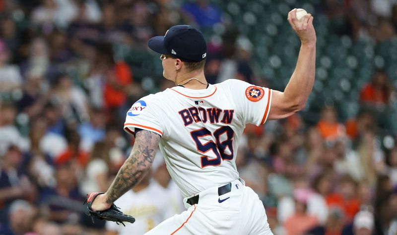 May 27, 2025; Houston, Texas, USA;Houston Astros starting pitcher Hunter Brown (58) pitches against the Athletics in the first inning at Daikin Park. Mandatory Credit: Thomas Shea-Imagn Images