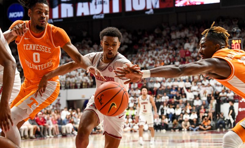 Mar 2, 2024; Tuscaloosa, Alabama, USA;  Tennessee forward Jonas Aiddo (0), Alabama guard Rylan Griffen (3) and Tennessee guard Jahmai Mashack (15) go for a loose ball at Coleman Coliseum. Mandatory Credit: Gary Cosby Jr.-USA TODAY Sports