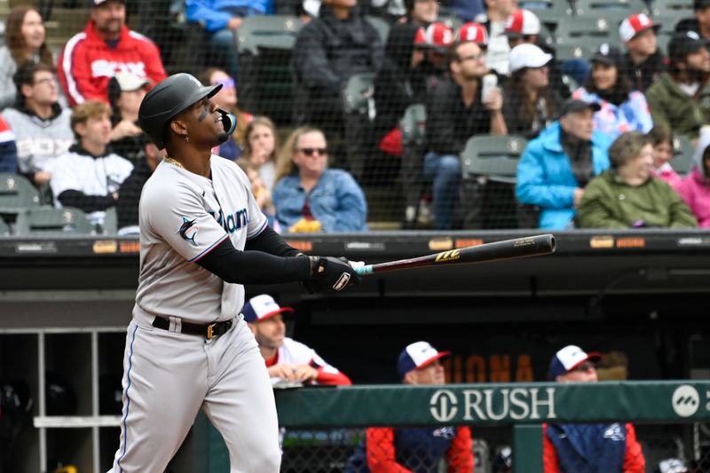 Jun 11, 2023; Chicago, Illinois, USA;  Miami Marlins designated hitter Jorge Soler (12) hits a home run against the Chicago White Sox during the fifth inning at Guaranteed Rate Field. Mandatory Credit: Matt Marton-USA TODAY Sports