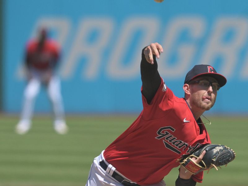 Apr 26, 2023; Cleveland, Ohio, USA; Cleveland Guardians starting pitcher Tanner Bibee (61) throws a pitch during the first inning against the Colorado Rockies at Progressive Field. Mandatory Credit: Ken Blaze-USA TODAY Sports