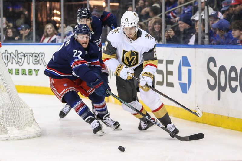 Jan 26, 2024; New York, New York, USA; New York Rangers center Jonny Brodzinski (22) and Vegas Golden Knights center Brett Howden (21) chases the puck in the third period at Madison Square Garden. Mandatory Credit: Wendell Cruz-USA TODAY Sports