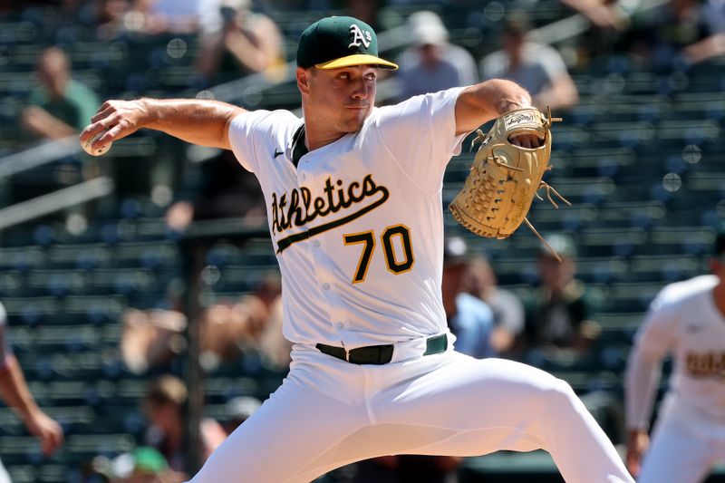 Aug 31, 2025; West Sacramento, California, USA; Athletics starting pitcher J.T. Ginn(70) throws a pitch against the Texas Rangers during the first inning at Sutter Health Park. Mandatory Credit: Dennis Lee-Imagn Images