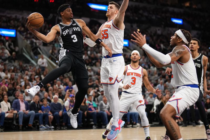 SAN ANTONIO, TX - MARCH 29:  Keldon Johnson #3 of the San Antonio Spurs passes the ball during the game against the New York Knicks on March 29, 2024 at the Frost Bank Center in San Antonio, Texas. NOTE TO USER: User expressly acknowledges and agrees that, by downloading and or using this photograph, user is consenting to the terms and conditions of the Getty Images License Agreement. Mandatory Copyright Notice: Copyright 2024 NBAE (Photos by Darren Carroll/NBAE via Getty Images)