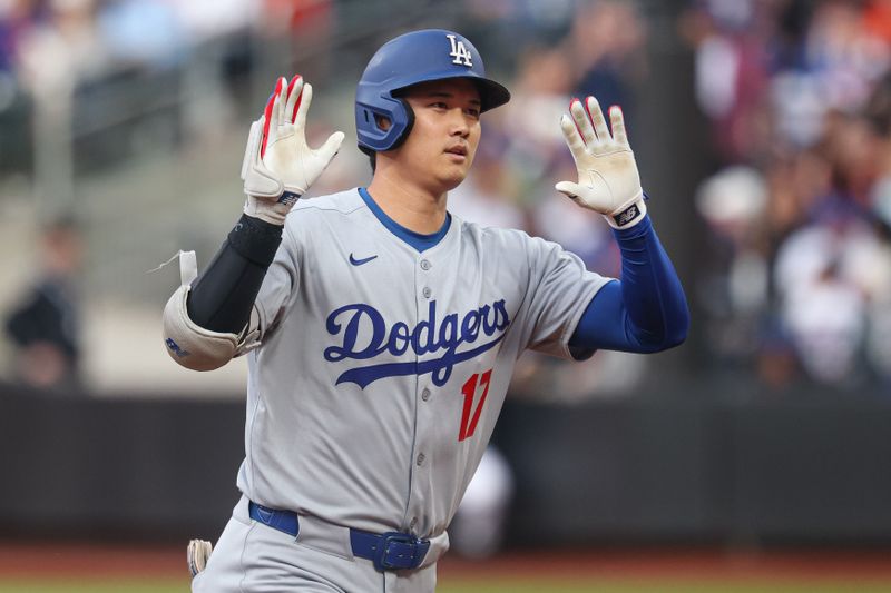 May 25, 2025; New York City, New York, USA; Los Angeles Dodgers designated hitter Shohei Ohtani (17) rounds the bases after a solo home run during the first inning against the New York Mets at Citi Field. Mandatory Credit: Vincent Carchietta-Imagn Images