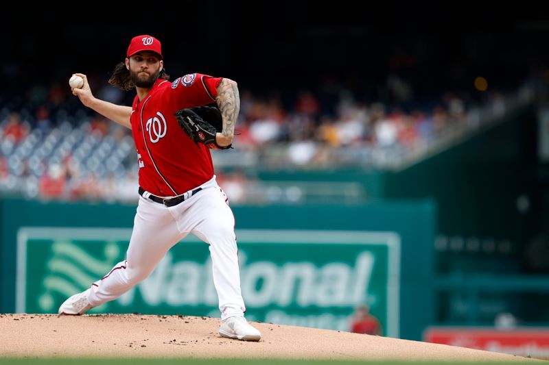 Aug 13, 2023; Washington, District of Columbia, USA; Washington Nationals starting pitcher Trevor Williams (32) pitches against the Oakland Athletics during the first inning at Nationals Park. Mandatory Credit: Geoff Burke-USA TODAY Sports