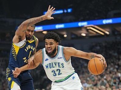 MINNEAPOLIS, MN -  DECEMBER 16: Karl-Anthony Towns #32 of the Minnesota Timberwolves handles the ball during the game against the Indiana Pacers on December 16, 2023 at Target Center in Minneapolis, Minnesota. NOTE TO USER: User expressly acknowledges and agrees that, by downloading and or using this Photograph, user is consenting to the terms and conditions of the Getty Images License Agreement. Mandatory Copyright Notice: Copyright 2023 NBAE (Photo by Jordan Johnson/NBAE via Getty Images)