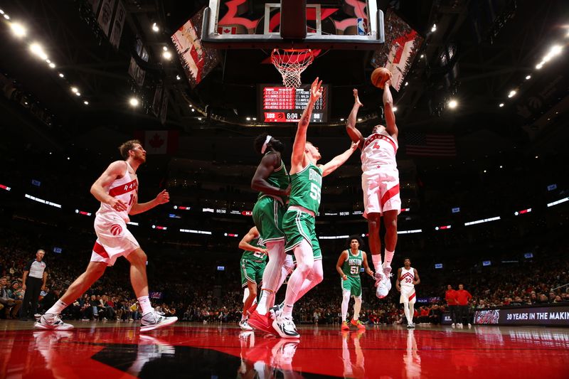 TORONTO, CANADA - OCTOBER 15: Scottie Barnes #4 of the Toronto Raptors drives to the basket during the game against the Boston Celtics on October 15, 2024 at the Scotiabank Arena in Toronto, Ontario, Canada.  NOTE TO USER: User expressly acknowledges and agrees that, by downloading and or using this Photograph, user is consenting to the terms and conditions of the Getty Images License Agreement.  Mandatory Copyright Notice: Copyright 2024 NBAE (Photo by Vaughn Ridley/NBAE via Getty Images)