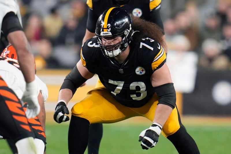 Pittsburgh Steelers guard Isaac Seumalo (73) blocks during the first half of an NFL football game against the Cincinnati Bengals in Pittsburgh, Saturday, Dec. 23, 2023. (AP Photo/Gene J. Puskar)