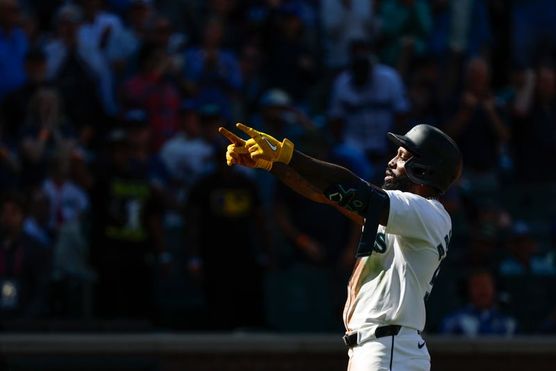 Aug 28, 2024; Seattle, Washington, USA; Seattle Mariners left fielder Randy Arozarena (56) reacts after hitting a solo-home run against the Tampa Bay Rays during the eighth inning at T-Mobile Park. Mandatory Credit: Joe Nicholson-USA TODAY Sports